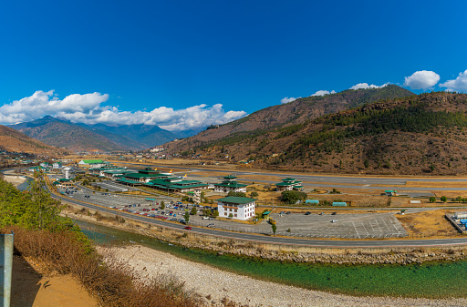 Panaromic view of Bhutan's airport in the middle of mountains