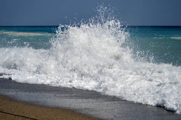 istock A high splash of the sea wave 2103439633