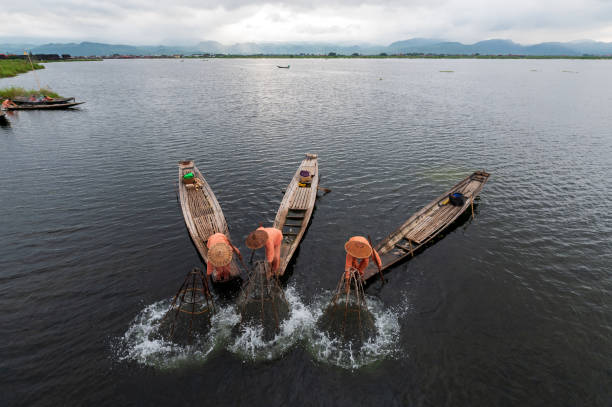 Inle, Myanmar - Feb 7, 2017. Motorboat carrying tourists on Inle Lake, Myanmar. Inle Lake a freshwater lake located in Shan State.