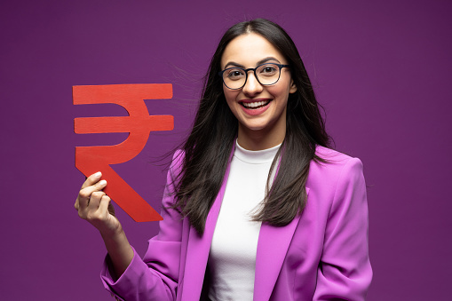 Portrait of her she nice well-dressed attractive lovely luxury pretty content cheerful girl isolated purple background