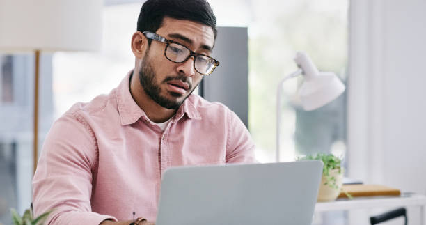 istock Tired, businessman and exhausted in office with technology, sad and burnout with worry or mental health. Bankruptcy crisis, fatigue or bored and pressure in online workplace for late deadline 2103453967