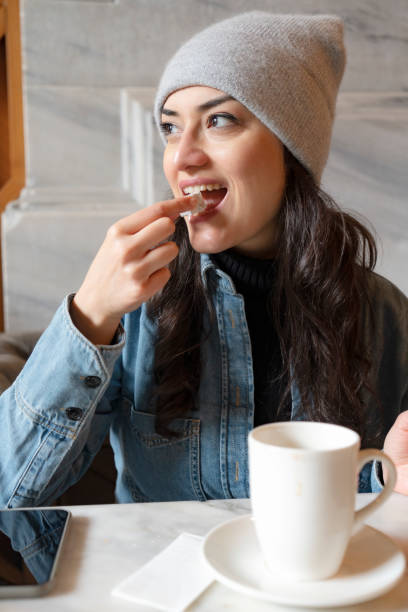 istock Woman in a cafe 2103473896