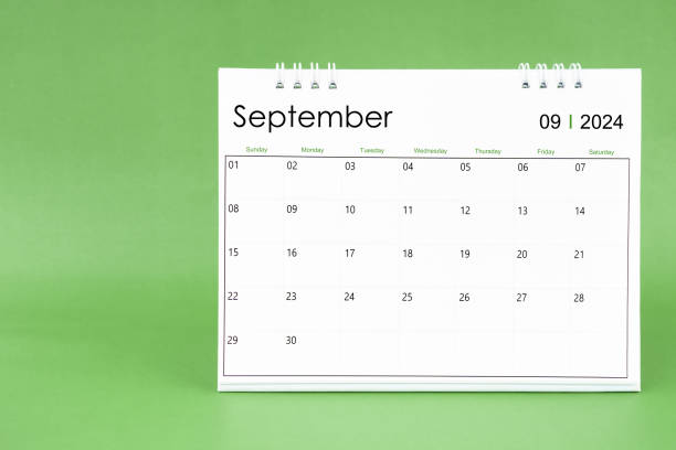 istock September 2024 desk calendar isolated in green background. 2103497739