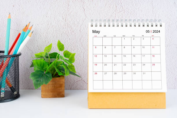 istock May 2024 Desk Calendar with pencil. 2103497742