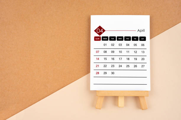 2024 April calendar page on brown paper background.