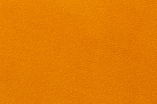 Yellow cotton fabric texture as background.