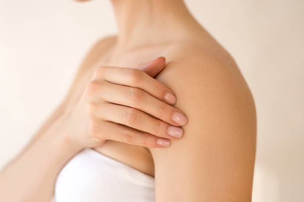 istock Woman toughing her soft skin 2103524697