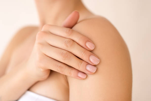 istock Woman toughing her soft skin 2103525740