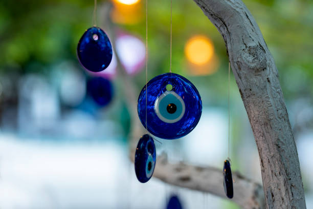 istock nazar, amulets, talismans against the evil eye on a tree in the garden. 2103601892
