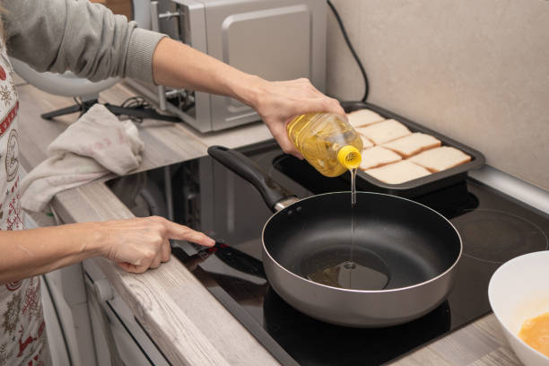 istock Pouring Oil for Frying Torrijas 2103639976