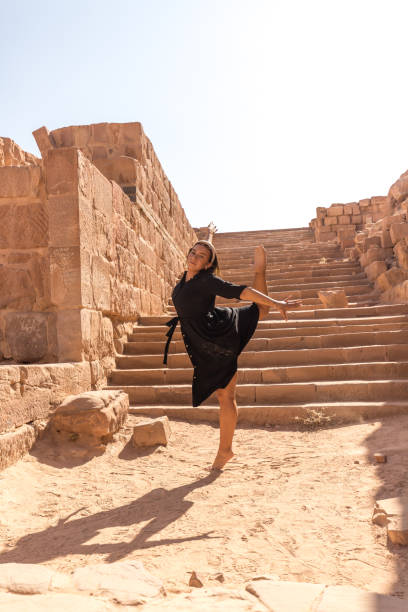 istock Dancing in Petra, the ancient city 2103714273