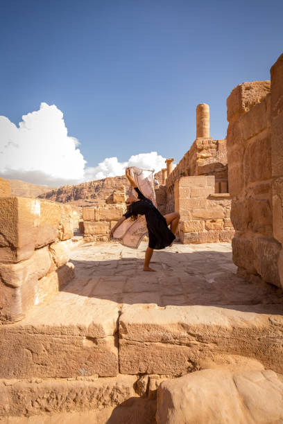 istock Dancing in Petra, the ancient city 2103714288