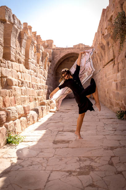 istock Dancing in Petra, the ancient city 2103714291