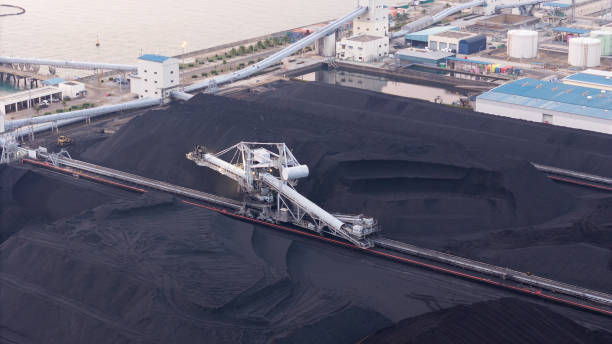 istock mining shovels, coal mine excavator working loading coal mine to Coal-fired power plant . Giant wheel of bucket wheel excavator in a brown coal open pit 2103812104