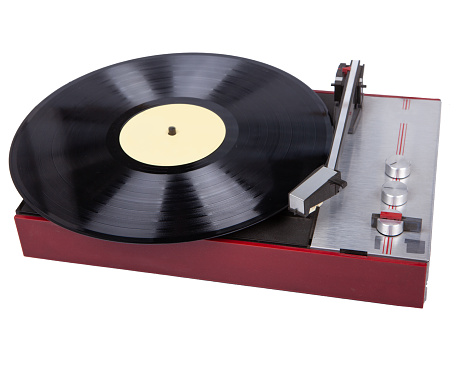 A record player with a black record on it