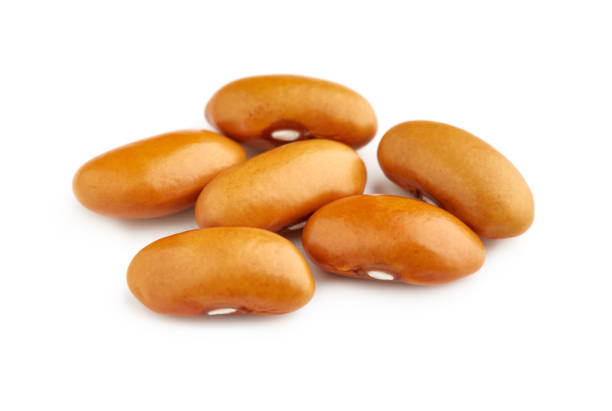 Yellow kidney bean isolated on white background. Yellow kidney bean texture background. A large bean with a subtle sweet flavor and soft texture. Beans. Proper nutrition. Vitamins. Healthy food.