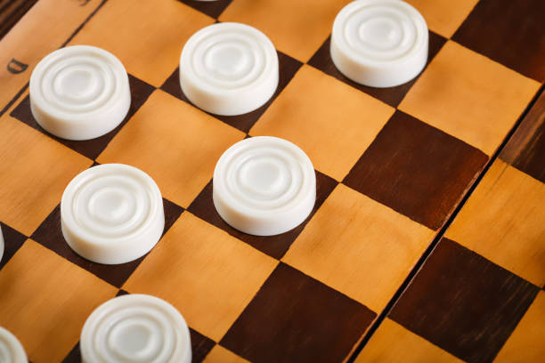 istock checkerboard with checkers. Game concept. Board game. Hobby. checkers on the playing field for a game. 2103860182