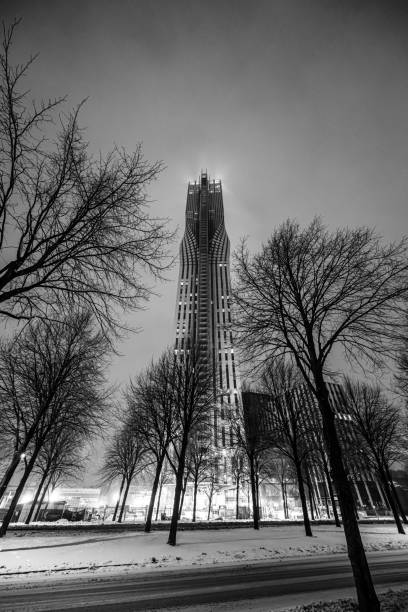 Gothenburg, Sweden - January 20 2024: Karlatornet skyscraper towering over Lindholmen on a snowy evening.