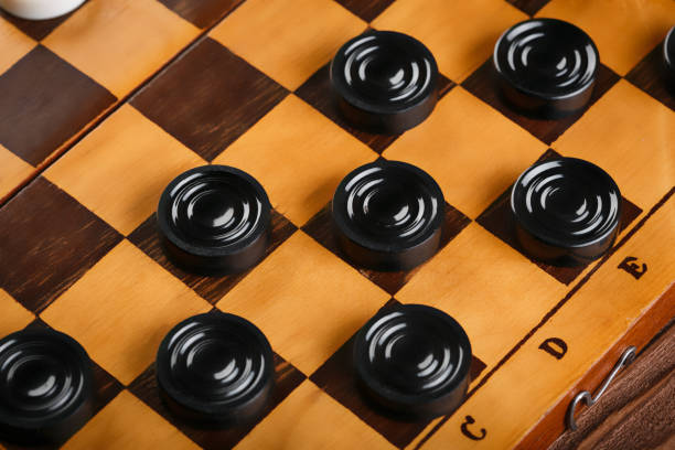 istock checkerboard with checkers. Game concept. Board game. Hobby. checkers on the playing field for a game. 2103862304