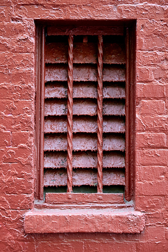 Drip Dried Red Paint on a Metal Vent