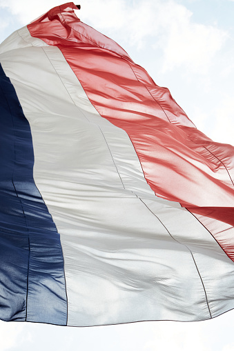 Vertical View of French Flag Flapping in Breeze