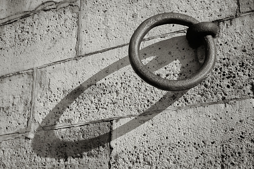 Cast Iron Ring in Brick Wall Near Seine River Paris France