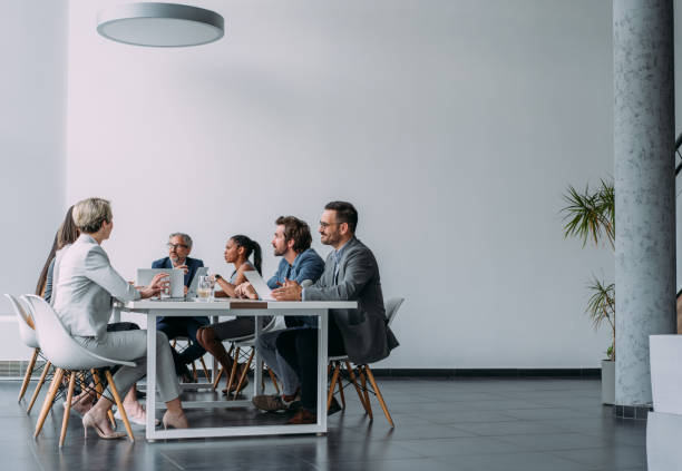 istock Business persons on meeting in the office. 2103894532