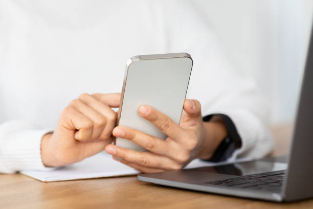 istock Cropped of woman independent contractor using gadgets 2103895610