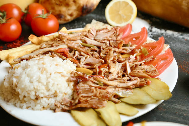 istock White Plate With Meat and Vegetable Topping 2103898291