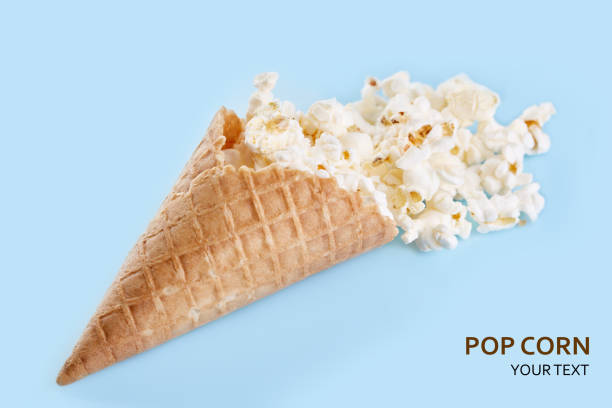 istock Popcorn border isolated on white. Film. Fast food. Corn 2103906215