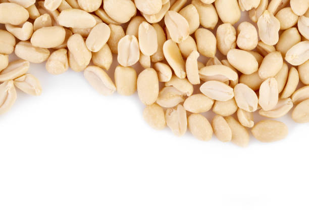 istock Peeled peanuts on a white background. Healthy food. Nuts. 2103910889