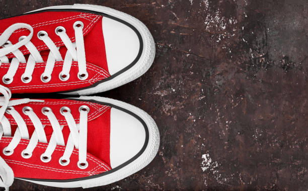 Multi-colored sneakers on black background