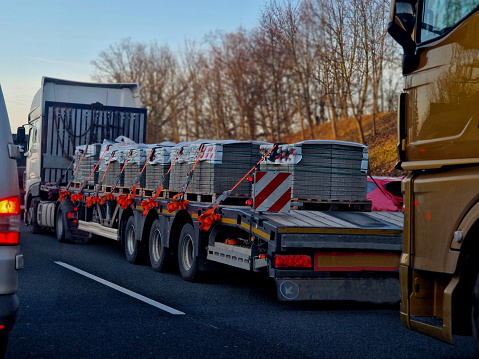 overloaded trucks are checked by customs officers by weighing. Fines are high for exceeding the permitted weight of a load of concrete paving pallets