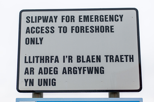 Warning sign near a beach in Wales advising civilians not to use the slipway