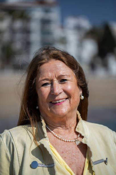 istock Older woman sightseeing in Sitges, Barcelona 2104061692