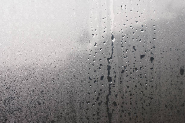 istock Water droplets from steam on the glass surface 2104126147