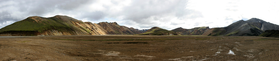 Scenes along the Landmannalaugar hike offer a kaleidoscope of breathtaking vistas, encompassing otherworldly volcanic landscapes, vibrant rhyolite mountains, cascading waterfalls, and steaming geothermal springs, immersing hikers in the raw, untamed beauty of Iceland's highlands.