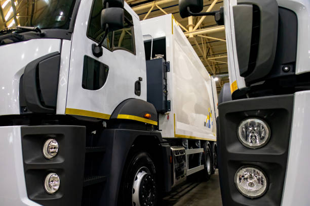 istock New white trucks with different cargo bases. 2104137494