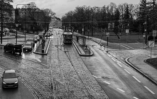 Cobbled tram lines in Prague. In the image you can see a tram coming towards the camera