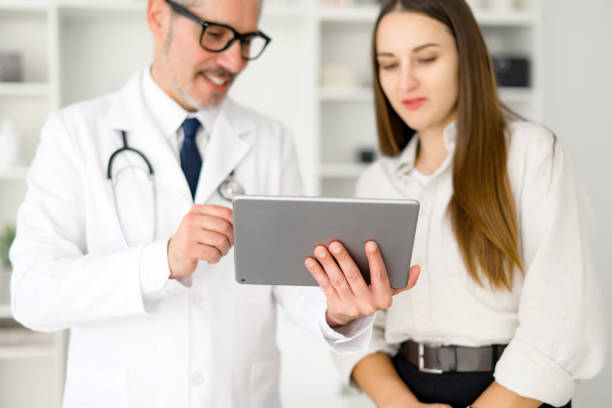 istock A conversation between a healthcare professional and a patient during appointment 2104166707