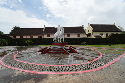 Makassar, Indonesia - March 21 2024: Statue of the hero Sultan Hasanuddin in front of Fort Rotterdam