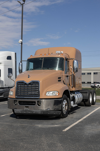 Indianapolis - March 20, 2024: Mack Semi Tractor Trailer Truck for sale. Mack Trucks is owned by Volvo.