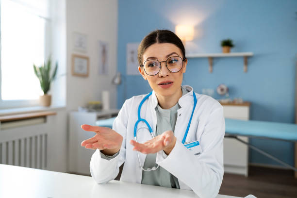 istock Female doctor talking during consultations, at the ordination 2104265902