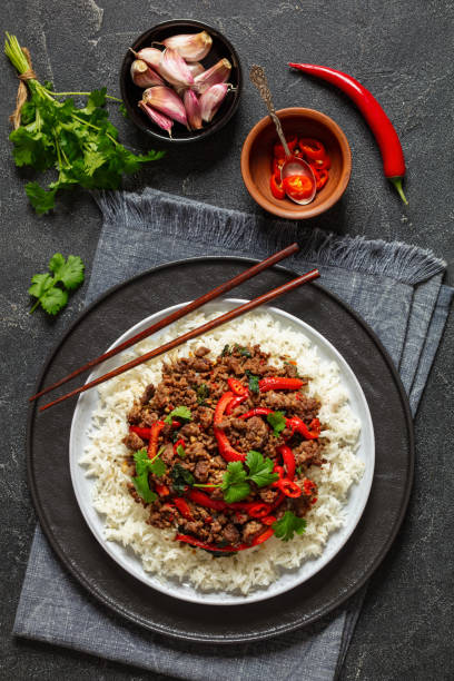 istock Thai holy basil stir fry with ground beef on plate 2104265943