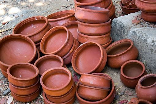 Handmade clay pots made from mud which is used for cooking in market.