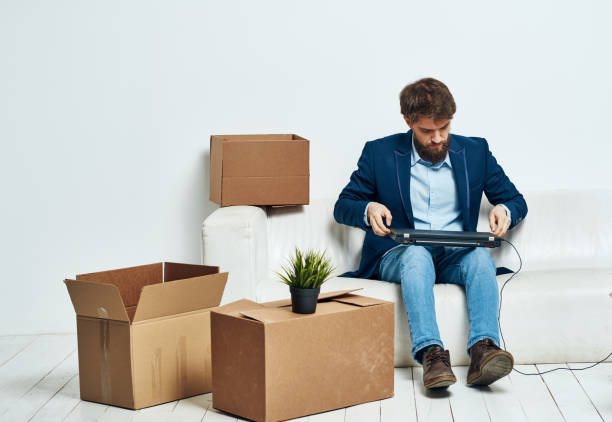 istock business man office box with lifestyle things official unpacking 2104394827