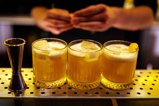 istock Making of whiskey sour cocktail. 2104402081