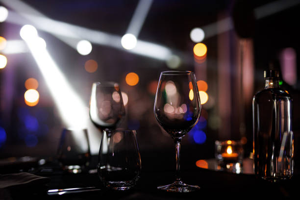 istock Elegant wine glass on the table during the event party. 2104402679