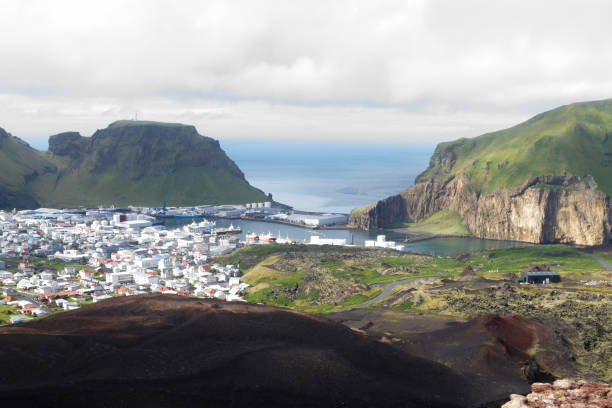 istock Heimaey town aerial view from Eldfell volcano. 2104487381