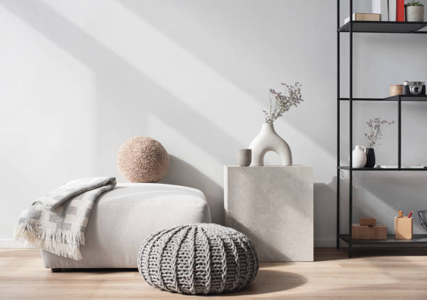 istock Interior design. Hassock, coffee table and bookshelf in a living room 2104495910